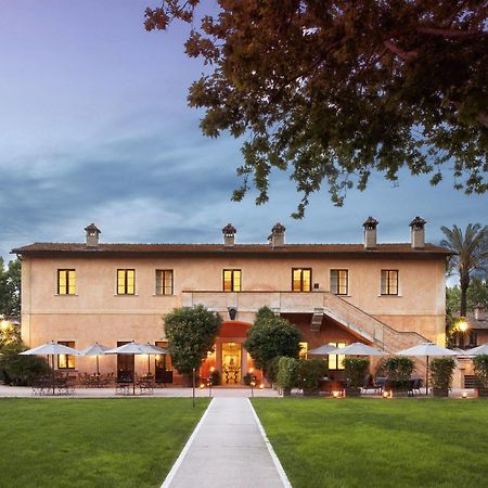 Qc Termeroma Spa And Resort Fiumicino Exterior foto The main building of the hotel